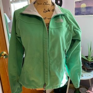 The north face green windwall jacket